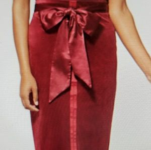 Red velvet pencil skirt with satin belt